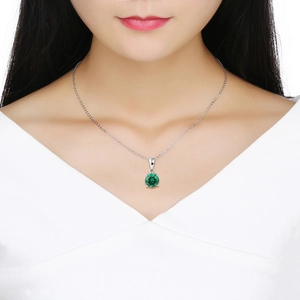 Elegant S925 sterling silver necklace featuring a round emerald green birthstone pendant