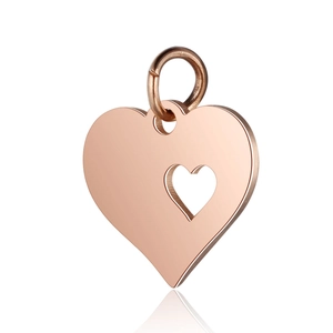 Detail view of heart-shaped hollow love pendant in rose gold finish for DIY necklaces
