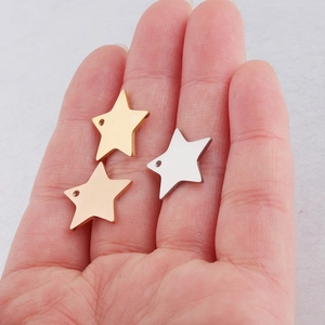 Set of three stainless steel star pendants in gold silver and rose gold finishes
