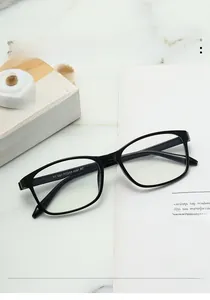 Detail view of black rectangular TR90 glasses frame with fashion flat lenses and size engraving