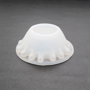 Macro detail of translucent silicone resin mold featuring a wavy volcanic base texture