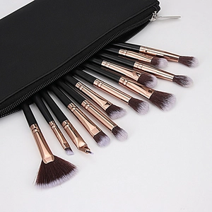 Champagne gold and black makeup brush set with 12 brushes and zipper travel case