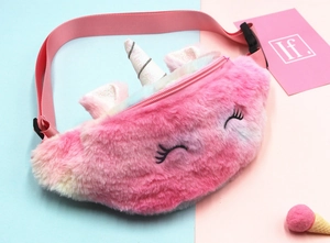 Detail of plush unicorn waist bag showing soft gradient fur, glitter ears, and adjustable strap