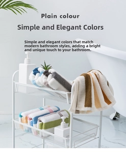 Premium thick cotton towels in striped and solid patterns displayed on a white shelf
