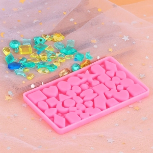 Pink silicone DIY jewelry mold for hearts and geometric resin pendant shapes