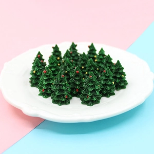 Miniature green resin Christmas trees with colorful ornaments for DIY craft projects