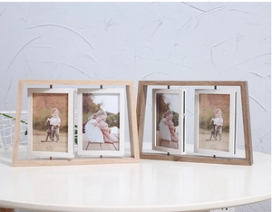 Close-up of rotatable 4x6 inch double-sided wooden photo frames in light and dark finishes