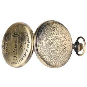 Detail view of engraved bronze pocket watch showing inner lid with To My Son message