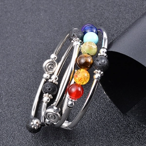 Multilayer wrap bracelet featuring natural volcanic lava stone and colorful chakra beads