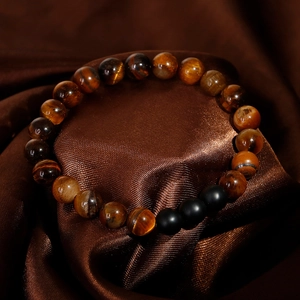 Vintage beaded bracelet with tiger eye stones and matte black beads on brown silk fabric