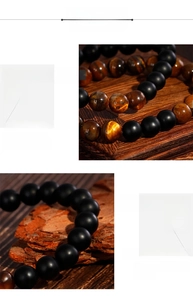 Macro shot of matte black onyx and tiger eye beads on a vintage beaded stretch bracelet