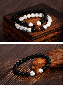 Detail von 8mm matten schwarzen Achat-, weißen Marmor- und Tigeraugen-Perlenarmbändern