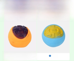 Detail of dog chew balls with bone patterns for dental cleaning and interactive play