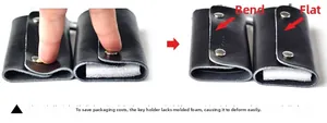 Detail of black leather key case comparing bent and flat shapes with metal snaps