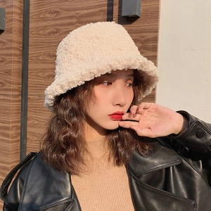 Cozy cream-colored faux lamb wool bucket hat for women in a warm winter style