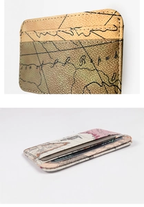 Close-up of vintage map print card holder showing stitching and slim multi-slot design