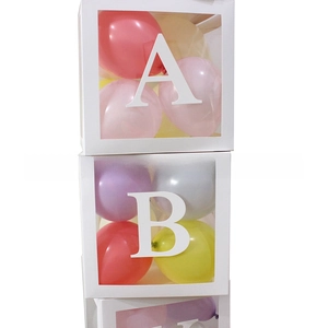 Close-up of white transparent balloon box with letters A and B for party decorations