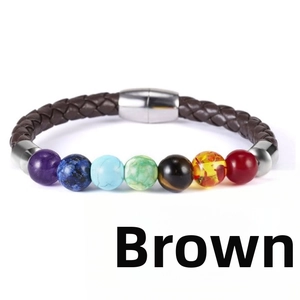 Detail view of seven chakra beads on brown braided leather bracelet with magnetic clasp
