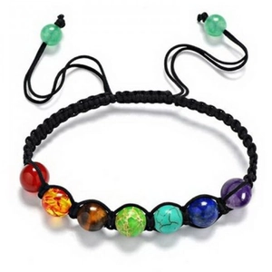 Adjustable rainbow bead woven bracelet with seven colorful chakra stones on black rope