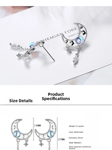Detail of moon tassel earrings with blue moonstone and zircon, size 13mm by 27mm