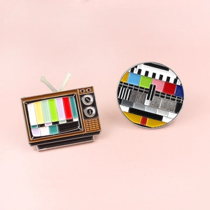 Vintage TV enamel pin set featuring retro television shape and signal test pattern display