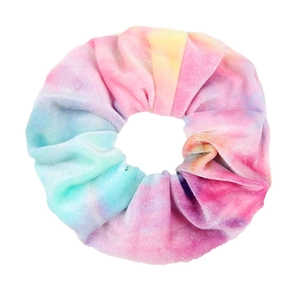 Detail of soft velvet tie-dye scrunchie in vibrant pink, purple, and blue gradient colors