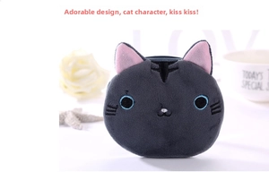 Detail of cute dark grey plush cat coin purse with pink ears and embroidered facial features