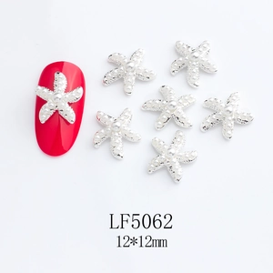 Detailed 12x12mm starfish nail charm with white pearls on silver base for DIY manicure