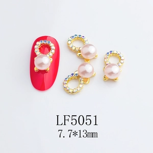 Detailed view of 7.7x13mm star pink pearl nail charms with colorful rhinestones LF5051