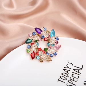 Exquisite crystal floral wreath brooch with multi-colored rhinestones on gold-plated base