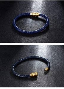 Detail of blue braided leather bracelet featuring a gold magnetic clasp closure