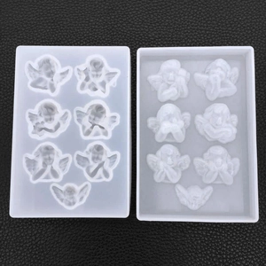 Détail du moule en silicone translucide avec sept motifs d'anges pour moulage résine