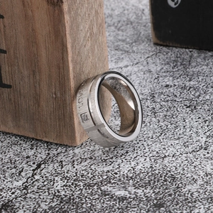 Brushed stainless steel couple ring with LOVE engraving and tiny inset zircon stone