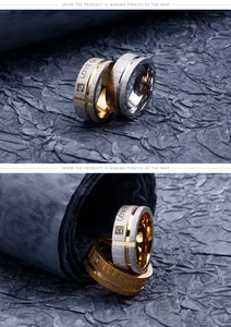 Close-up of 'LOVE ONLY' engraved brushed titanium steel rings with micro-set zircon stone
