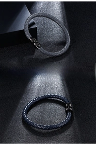 Detail of woven microfiber leather bracelets with black magnetic metal clasp