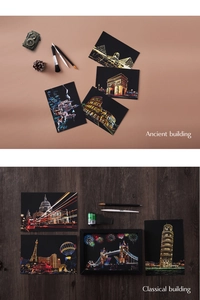 Detail view of architecture scratch art postcards with stylus tools and vintage props