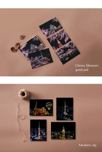 Artistic layout of city night and cherry blossom scratch art postcards with rustic props