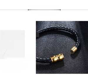 Detail view of black braided microfiber leather bracelet with gold 316L stainless steel clasp
