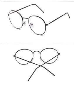 Detailed views showing the side profile and back hinge of metal round eyeglasses