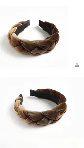 Detail of a brown velvet braided headband with a retro twist design and non-slip lining