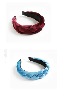 Detail of burgundy and light blue braided velvet headbands with soft plush texture