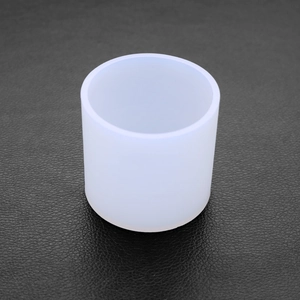 Detailed top view of a translucent white cylindrical silicone mold for resin jewelry DIY