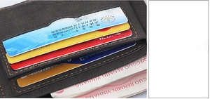 Detail of male vintage wallet interior with multiple card slots and orange stitching