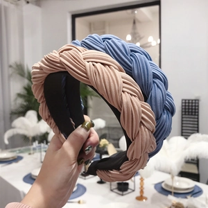 Braided wide headband for women in dusty blue and soft pink with pleated fabric texture