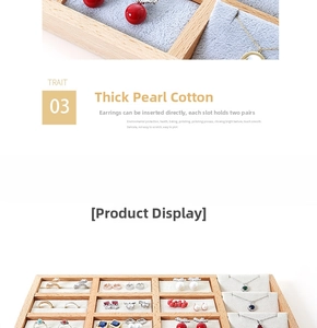 Macro detail of wooden 12-grid jewelry tray with pearl cotton inserts for ring display