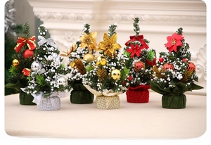 Mini Christmas tree set with white flocking and festive ornaments on fabric bases