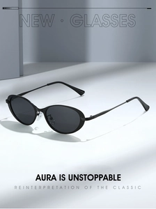 Detail of black oval frame sunglasses with slim metal temples on geometric background