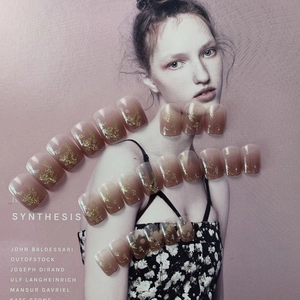 Milk tea gradient press-on nails with gold foil flakes on a fashion magazine background