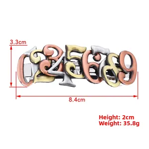 Close-up of vintage steampunk alloy hair clip featuring layered metallic numbers design