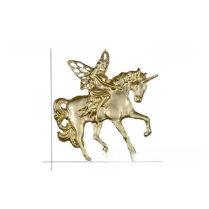 Detailed view of matte gold unicorn fairy brooch showing 50mm height and 48mm width specs